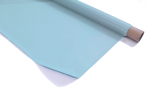 Rosco Sky Blue Projection Screen partially unravelled from a roll