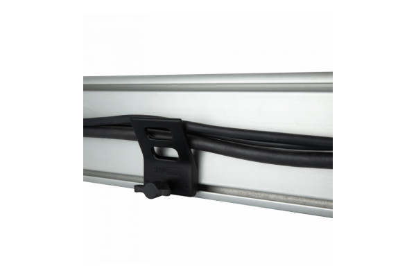An Image of the Showgear clamp supporting cables on the rail