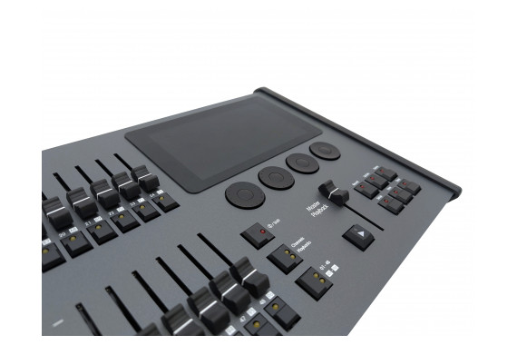 A Close up image of the FLX S48 showing the the 7" touch screen, four encoder wheels and master fader