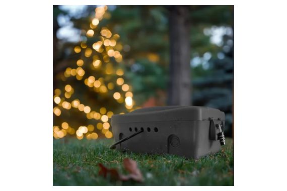 An Image of the grey weatherproof box being used outdoors