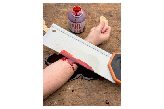 An image of the theatrical blood in use upon an arm