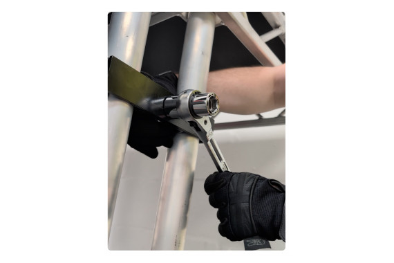 An image of the Stage Podger being used to tighten a clamp between two stage legs