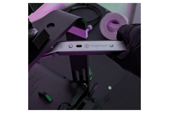 An Image of the Stage Depot Quad Spanner being used to tighten a bolt upon the top of the spanner