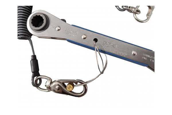 An Image of the Stage Depot Tool lanyard connected to the Stage Depot Quad Spanner