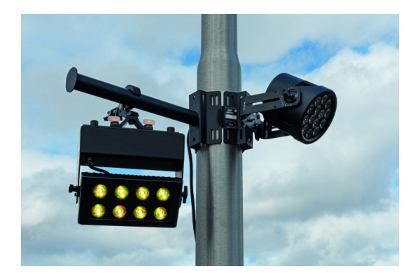 An Image of the bracket being used on a post with lighting fixtures attached