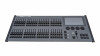 A photo of the front of the Zero88 FLX S48 Lighting console showing the 40 faders, encoder wheels & 7" Touch Screen