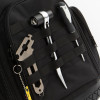 Dirty Rigger backpack with tools stored on the front